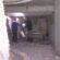 Працівники ПП “Благоустрій” проводять теплоізоляцію труб у підвалі