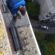 Працівники ПП”Вікторія-М” ремонтують дашок над балконом